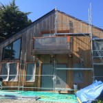 renovation maison bois  Dégrisement et saturateur coloris gris vue d'ensmble avec echafaudage